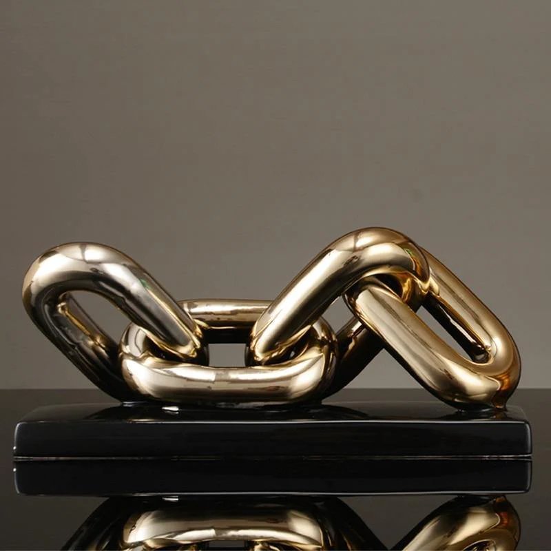 Keramiek sculptuur Art 4 schakel goud/zwart