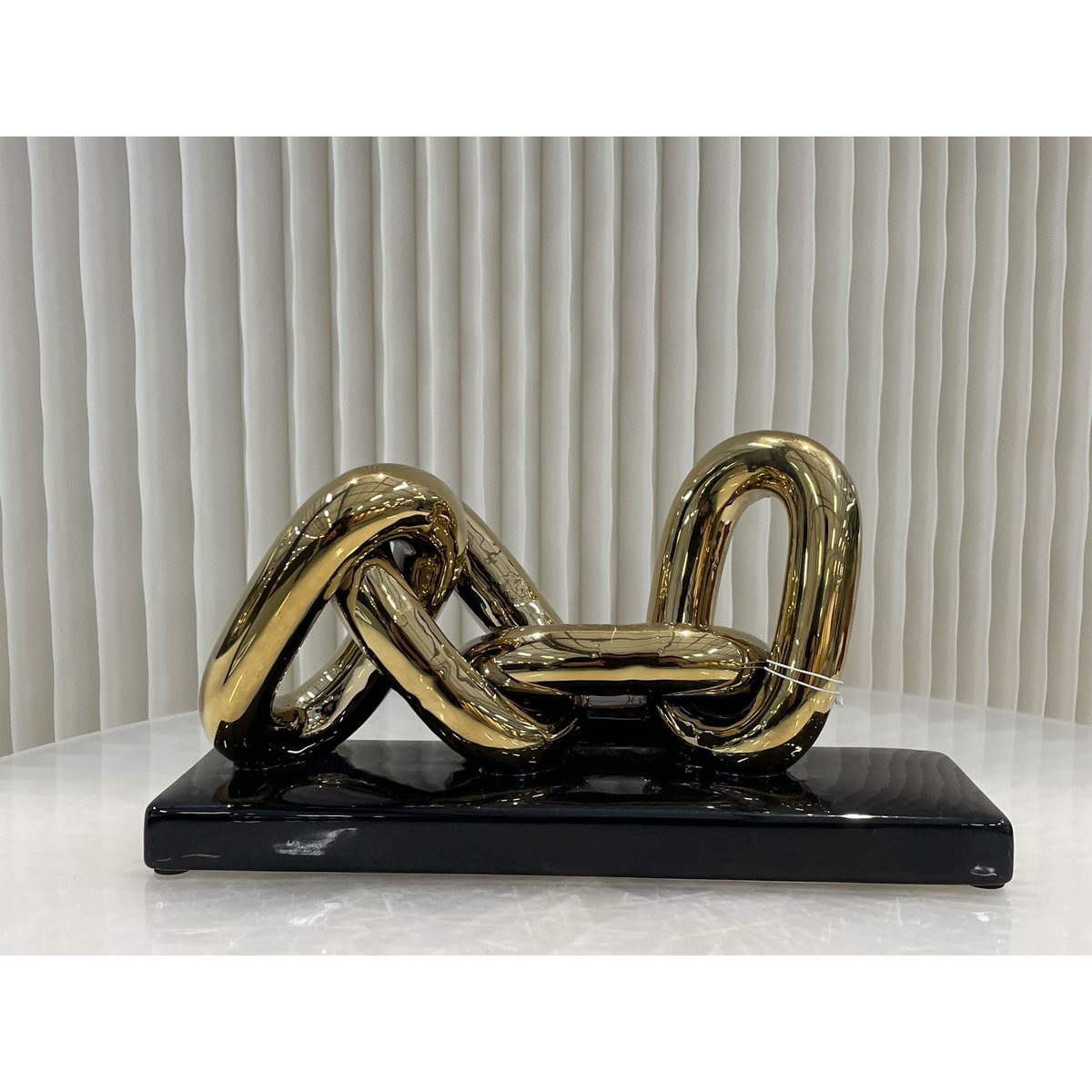 Keramiek sculptuur Art 4 schakel goud/zwart